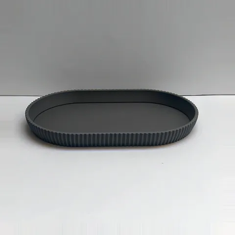 Schlüsselschale oval gerippt, flach von Slick: Schlüsselschale frontal, Riffelung und Höhe, 3D-Druck aus mattem PLA in Grau