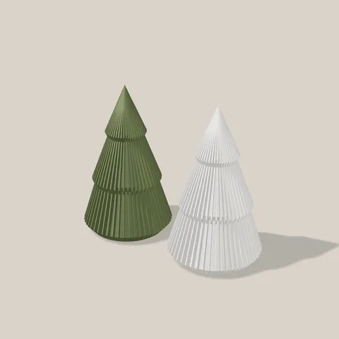 Mini-Tannenbaum in Dunkelgrün und Weiß nebeneinander