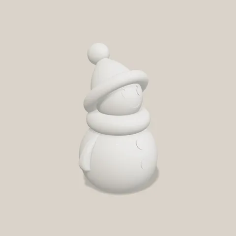 Kleiner Schneemann schräg von links mit Schal